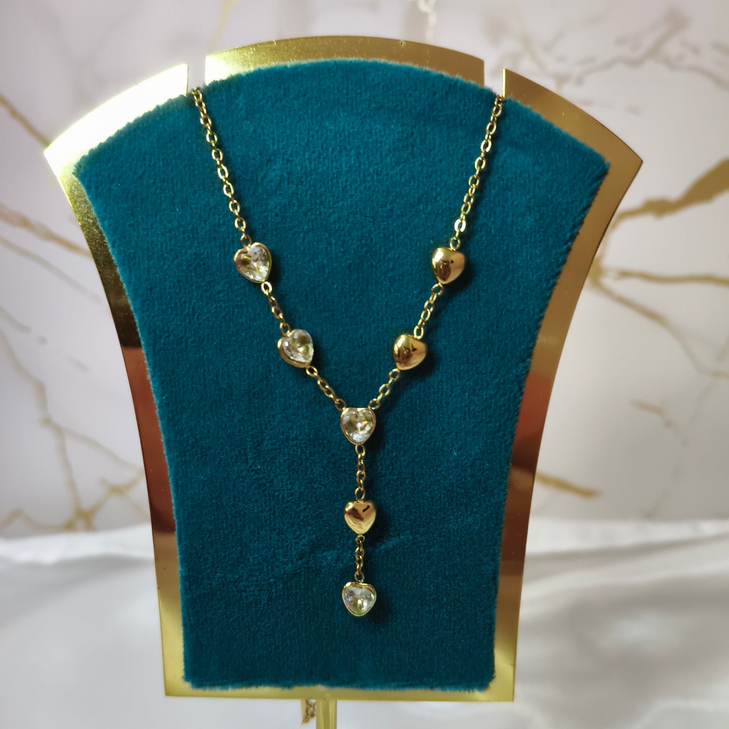 Handing Diamond Gold Hearts