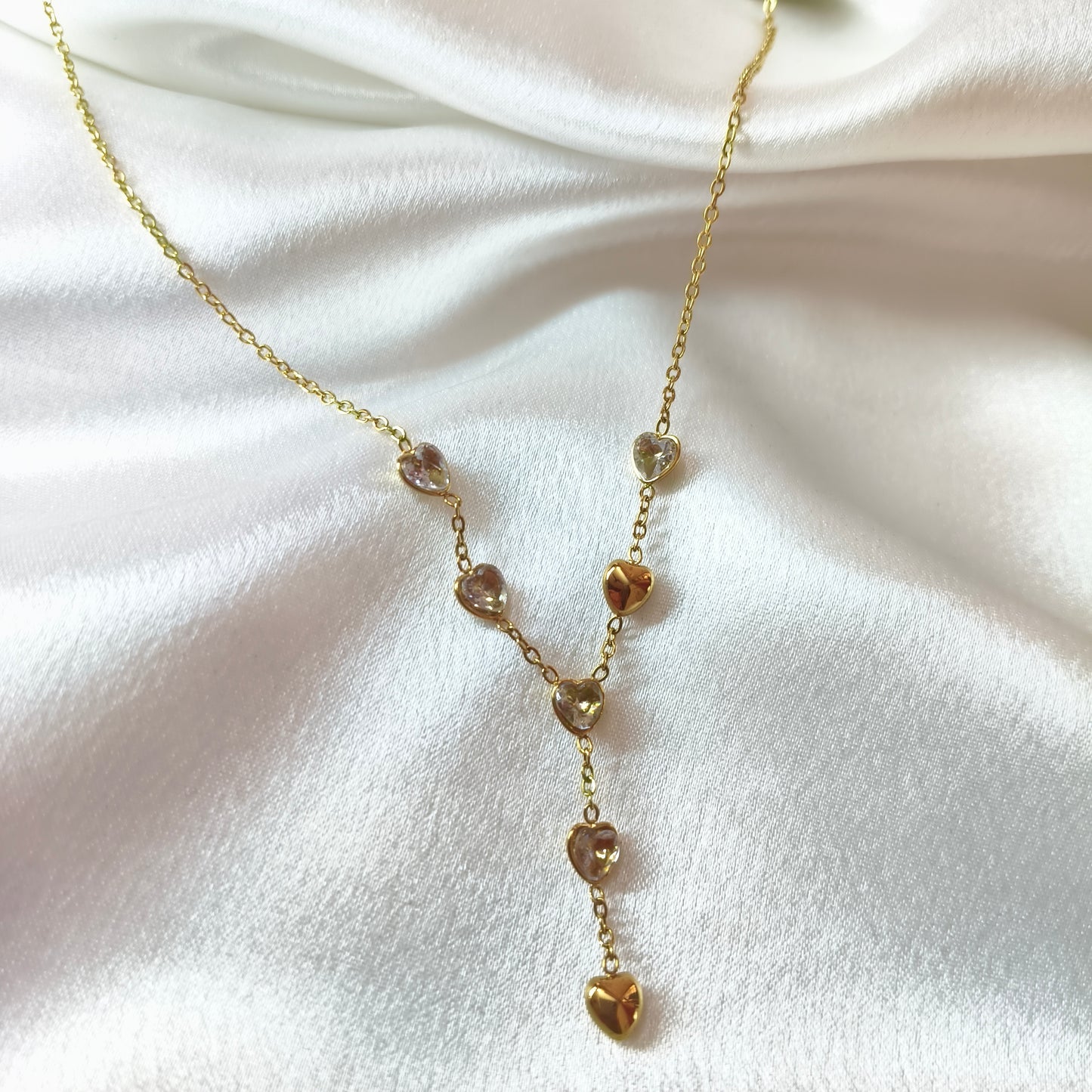 Handing Diamond Gold Hearts